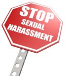 Stop sexual harassment road sign