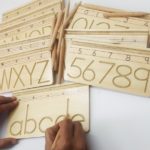 Wooden writing practice board