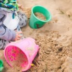 little-boy-playing-in-the-sand