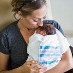 Mother-Kissing-her-Newborn-Premature-Baby-in-Hospital