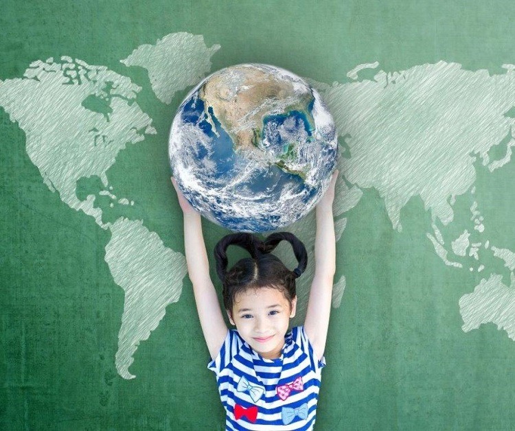Happy Asian girl child student raising globe