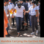 Mandira Carrying the Earthen Pot