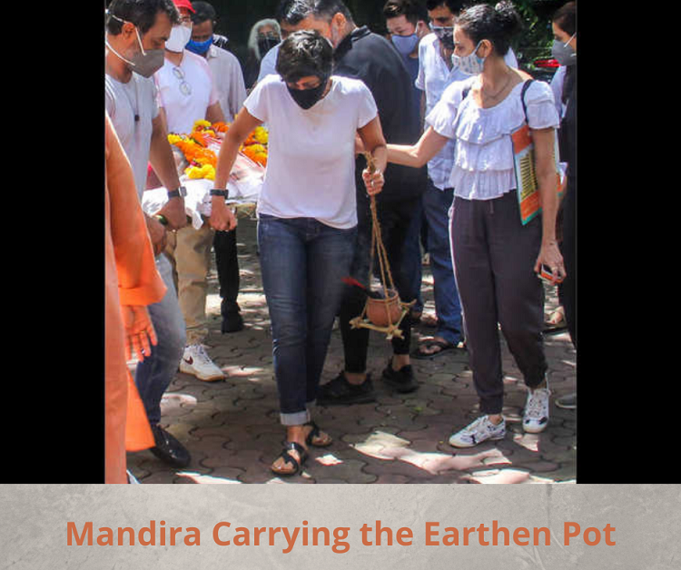 Mandira Carrying the Earthen Pot
